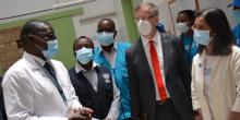 Dr Collins Tabu MOH Vaccines head, speaks to Wr Dr Rudi Eggers, Unicef Rep Maniza Zaman and other staff during the visit to the Central Vaccines Stores 