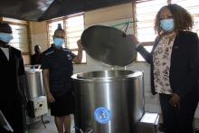 The Honorable Minister (right) and the WHO representative (left) inspecting the new pots