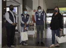 Deputy High Commissioner of the British High Commission in Namibia, Ms Charlotte Fenton, and representatives of the World Health Organization in Namibia at the airport welcoming the UKEMT