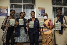 WHO staff and a Community Health Worker during site visit in Dar es Salaam