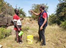 WHO staff demonstrating water chlorine testing during the rapid assessment