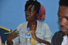 A Journalist interacting with facilitators during the health reporters symposium