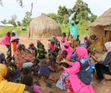 WHO and state team during a sensitization outreach at the settlement 