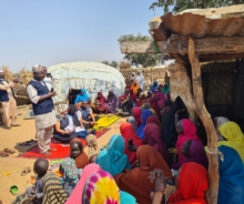 WHO personnel engaging with members of a community in Yobe state. 1