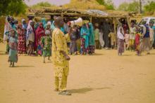 Danladi, a  town announcer during the vaccination campaign calling people out for vaccination by narrating his mengitis experience 