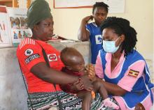 A nurse administers the Yellow Fever vaccine