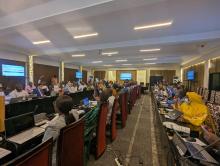 Attendees engaging with presentations during the workshop