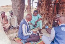 WHO technical experts meets with one of the community leaders to discuss importance of their participation in the outbreak response. © Kingsley Igwebuike/WHO