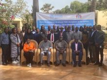 Participants take a group photo at the conclusion of the event