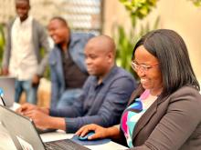 Mr Kasera, the Risk Communication and Community Engagement Coordinator in Kavango East Region in the middle engaging wit other RCCE Coordinators 