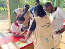 EMTs attending to Measles patients in Moroto