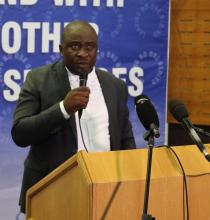 Minister of Health Hon. Selibe Mochoboroane giving his remarks on World Cancer Day commemoration in Maseru District.