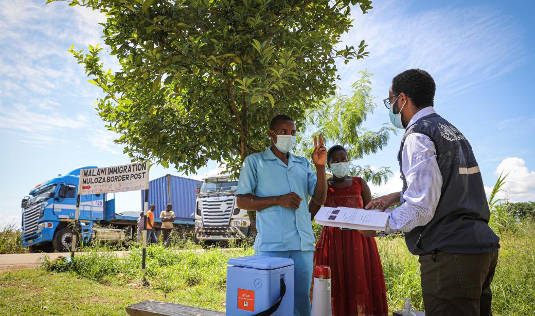 In the image, WHO STOP (Stop Transmission of Polio) consultant Mr. Fitwi Meles meets Douglas to follow up on number of babies vaccinated and on the status of the cold chain to preserve the vaccines. Mr. Meles recognizes the importance of each border health authority to pay special attention to its border communities, facilities and high-risk mobile populations to mitigate the risk of cross-border importation of Wild Polio Virus. 