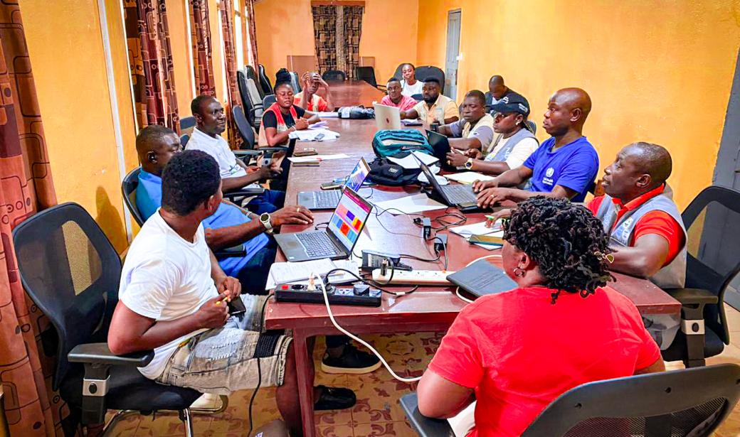 Healthcare workers conducting strategic planning and preparations for the polio vaccination campaign at county level.