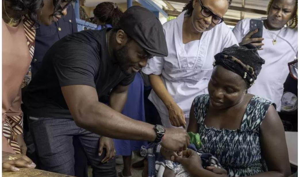 Celebrated football icon and coach Michael Essien, along with his wife, Akosua Puni Essien in Liberia advocating for the eradication of polio.