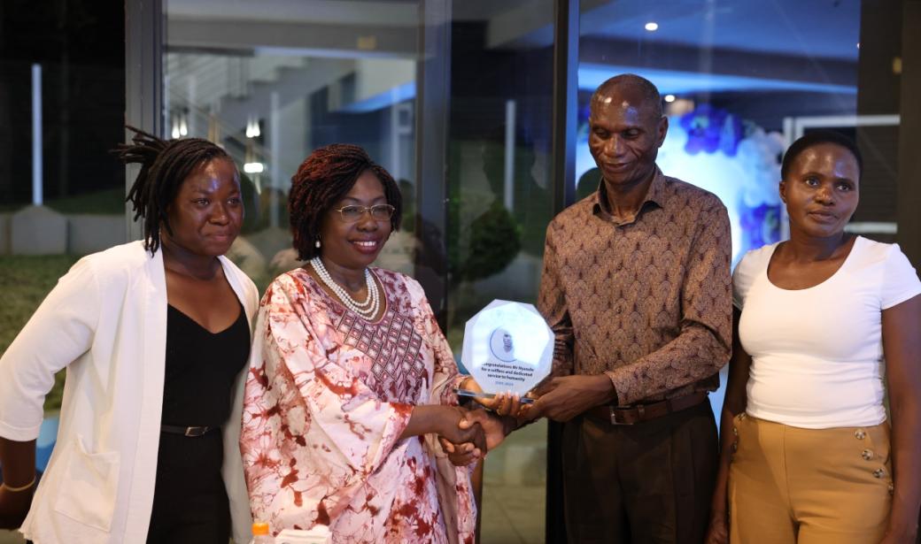 Nyasulu flanked by his 2 beautiful daughters owes his success to his family, for allowing him to sacrifice time with them to serve humanity